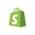 Green shopping bag icon with a white “S,” representing the Shopify e-commerce platform.
